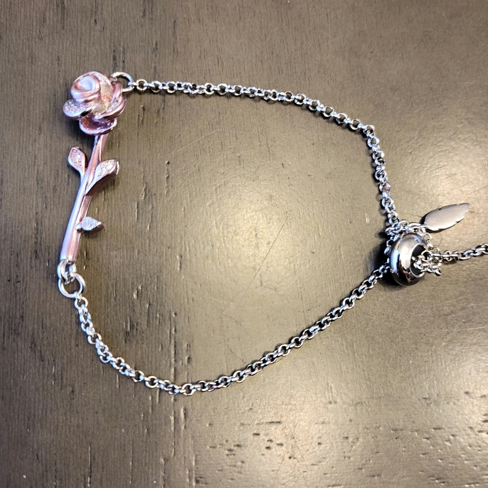 White gold bracelet with pink rose